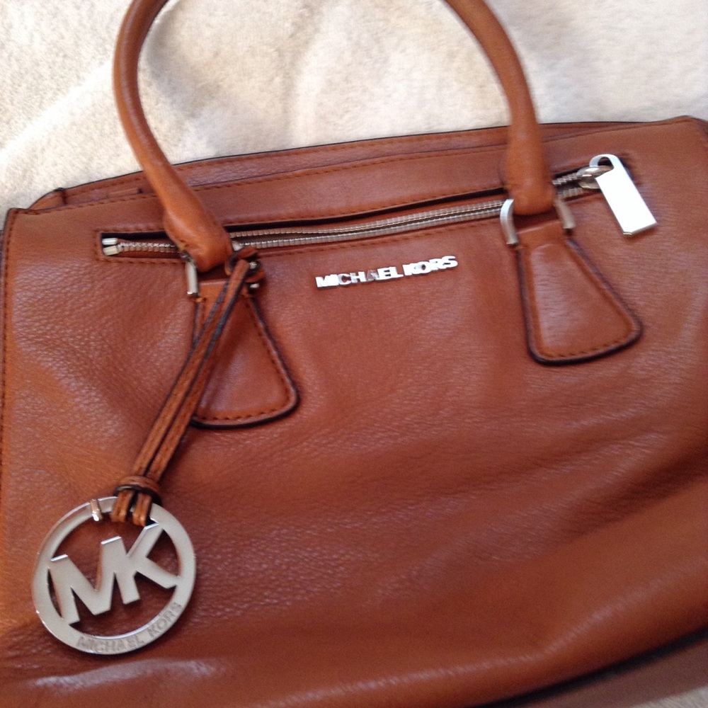 Michael Kors light brown leather purse,front pocke